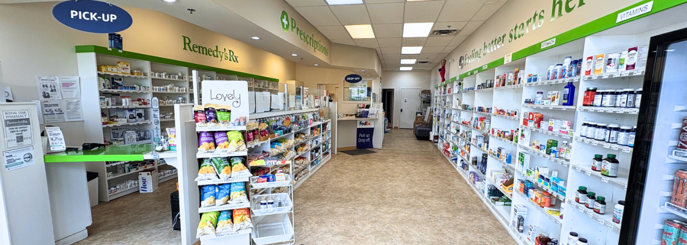 Wide view of Royal Oak Pharmacy’s interior, showing pick-up area, prescription counter, and product aisles